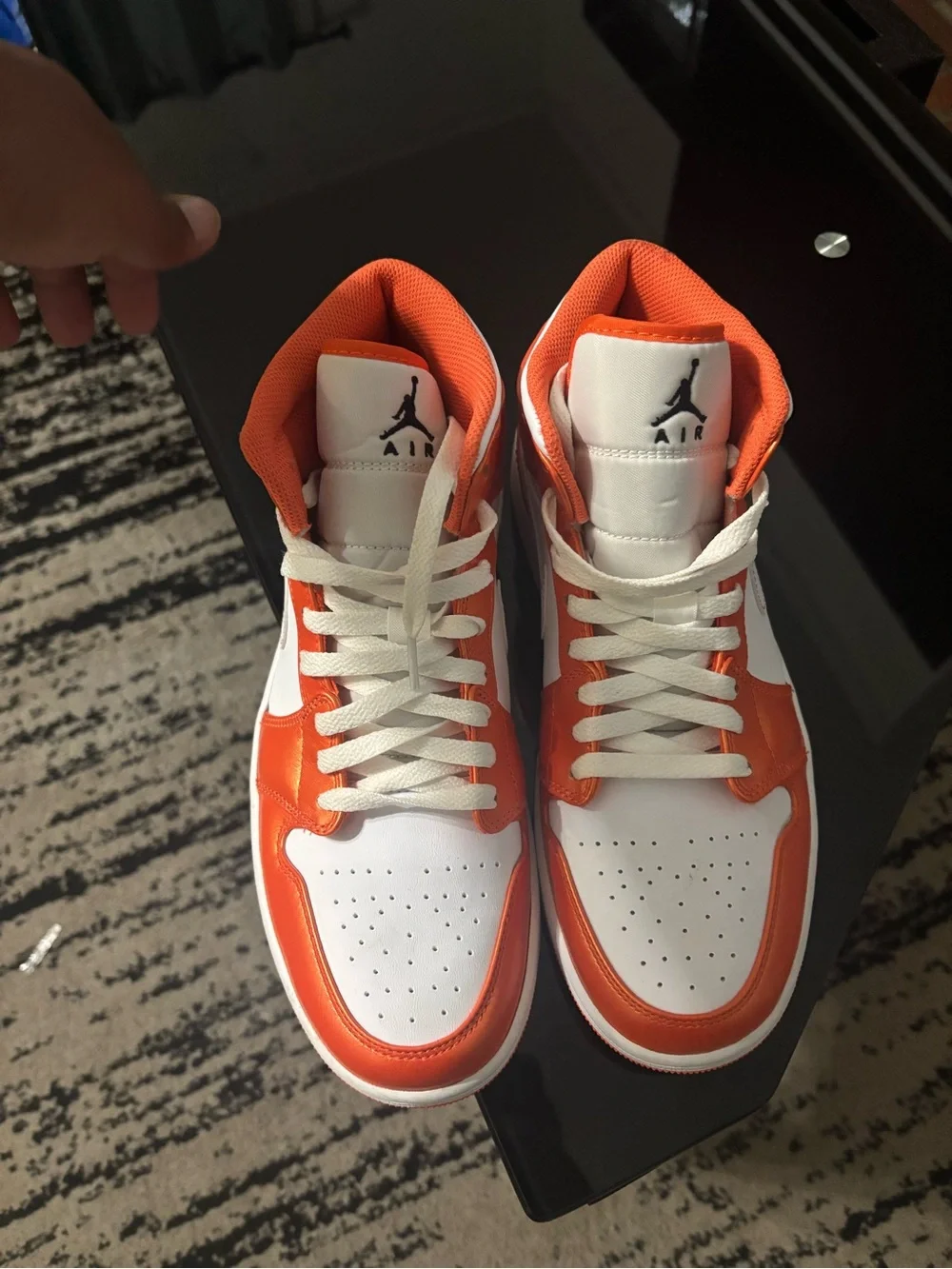 Jordan 1 Mid in White and Metallic Orange